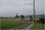 Der TPF RBDe 567 181 Pendelzug ist als RE 4020 ist kurz vor Vaulruz von Fribourg nach Bulle unterwegs. 

12. Mai 2020
