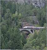 Und zum Schluss noch ein Bild des SBB  Giruno  RABe 501 016  Glarus , der als IC 2 von Zürich nach Lugano bei Wassen nun auf der obersten Ebene über die 61 Meter lange Kellerbachbrücke fährt. 

19. Okt. 2023