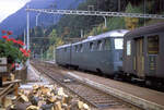 Ae 8/14 11852 vor einem Personenzug vermutlich mit Halt an allen Stationen.