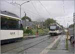 Ein eigentlich recht banales Alltagsbild aus Blonay, mit zwei Besonderheiten: 1. - es regnet (im August) und 2. - ich war nicht der einzige, der die CEV GTW ABeh 2/6 fotografierte...

Auf Gleis 1 ist der ABeh 2/6 7506 abgestellt, w�hrend der angeschnitten ABeh 2/6 links im Bild von Les Pl�iades kommend in Blonay angekommen ist und nach Vevey weiter fahren wird. Im Hintergrund ist wage der nun zur�ckversetze Zahnstangenanfang zu erkennen. 

21. August 2026