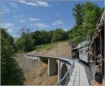 Die BFD HG 3/4 N° 3 der Blonay Chamby Bahn fährt mit ihrem Reisezug über den frisch sanierten Baye de Clarens Viadukt in Richtung Blonay und im Hintergrund zeigt sich das recht grosse
