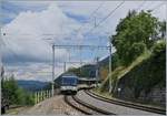 Mit dem Ast 117 trifft der MOB PE 2115 von Zweisimmen nach Montreux in Chamby ein.