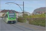 Unter einem Fahrleitungsmast, der wohl noch aus der Eröffnungszueit stammen wird, ist der TPC ASD ABe 4/8 471 in Aigle als R71 auf der Fahrt nach Les Diablerets. 
20. Okt 2024 Unter einem Fahrleitungsmast, der wohl noch aus der Eröffnungszueit stammen wird, ist der TPC ASD ABe 4/8 471 in Aigle als R71 auf der Fahrt nach Les Diablerets. 
20. Okt 2024