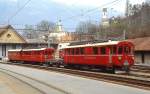 Im besten Licht stehen die Berninabahn-Triebwagen ABe 4/4 I 30 und 32 im April 1996 vor dem Depot Sand in Chur.