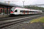 SBB 523 067 treft am regnerischen 15 Mai 2026 in Arth-Goldau ein und wird vom offenbarer Stelle fotografiert.
