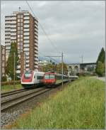 Ein ICN nach St.Gallen und ein Regio nach Biel/Bienne begegnen sich bei Grenchen.