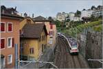 Ein Br�cken Blick bei Montreux auf die von Lausanne her kommende Strecke mit zwei in Montreux eintreffenden SBB RABe 523. 

25. Sept. 2026
