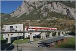 Ein TMR Region Alpes NINA RABe 525 überquert bei Sembrenche von Le Châble kommend den Sembrancher Viadukt. 

30. Okt. 2024