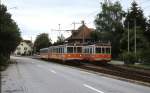 be-44/353238/auf-seiner-fahrt-von-niederbipp-nach Auf seiner Fahrt von Niederbipp nach Solothurn überholt Be 4/4 103 den im Bahnhof Buchli wartenden Be 4/4 302 (Juli 1997)