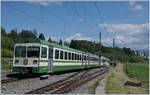 Der RBe 4/8 49 und LEB Be 4/8 34  Prilly  verlasen die Station Jouxtens-Mézery in Richtung Lausanne Flon.