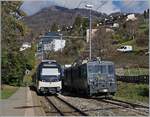 Der CEV MVR ABeh 2/6 7501 ist als Regio 34 von Les Avants nach Montreux unterwegs und fährt in Fontanivent an der abgestellen GDe 4/4 6002 vorbei.