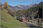 Der TMR RegionAlps RABe 525 041 (UIC 94 85 7525 041-0 CH-RA) ist von Orsières nach Sembracher unterwegs und erreicht La Douay, wo mangels Haltewunsch der Zug ohne Halt durchfährt    5.