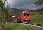 Der Blonay-Chamby Bernina Bahn ABe 4/4 I N° 35 auf seiner Fahrt nach Chaulin beim Halte in Cornaux.