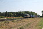 X4E 715 zieht einen LKW-Walter an der Netztrennstelle Mainz-Bischofsheim.