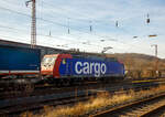 Die SBB Cargo Re 482 024-7 (91 85 4482 024-7 CH-SBBC) fährt am 20.02.2021 mit einem KLV-Zug durch Siegen (Kaan-Marienborn) in Richtung Norden bzw.