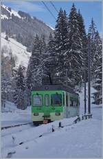 Der ASD BDe 4/4 403 und sein nicht zu sehender Bt sind beim verschneiten Vers l'Eglise auf dem Weg nach Les Diablerets.